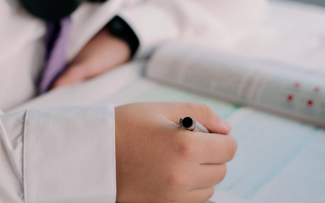 Student Writing in Notebook